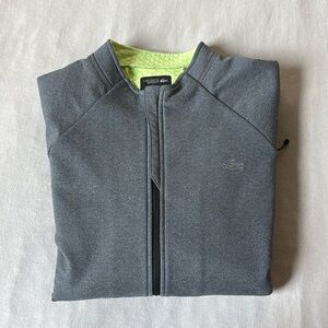 Lacoste Sport grey with Lime Green lining track Jacket.
Size 6 (XL). Men/Unisex.